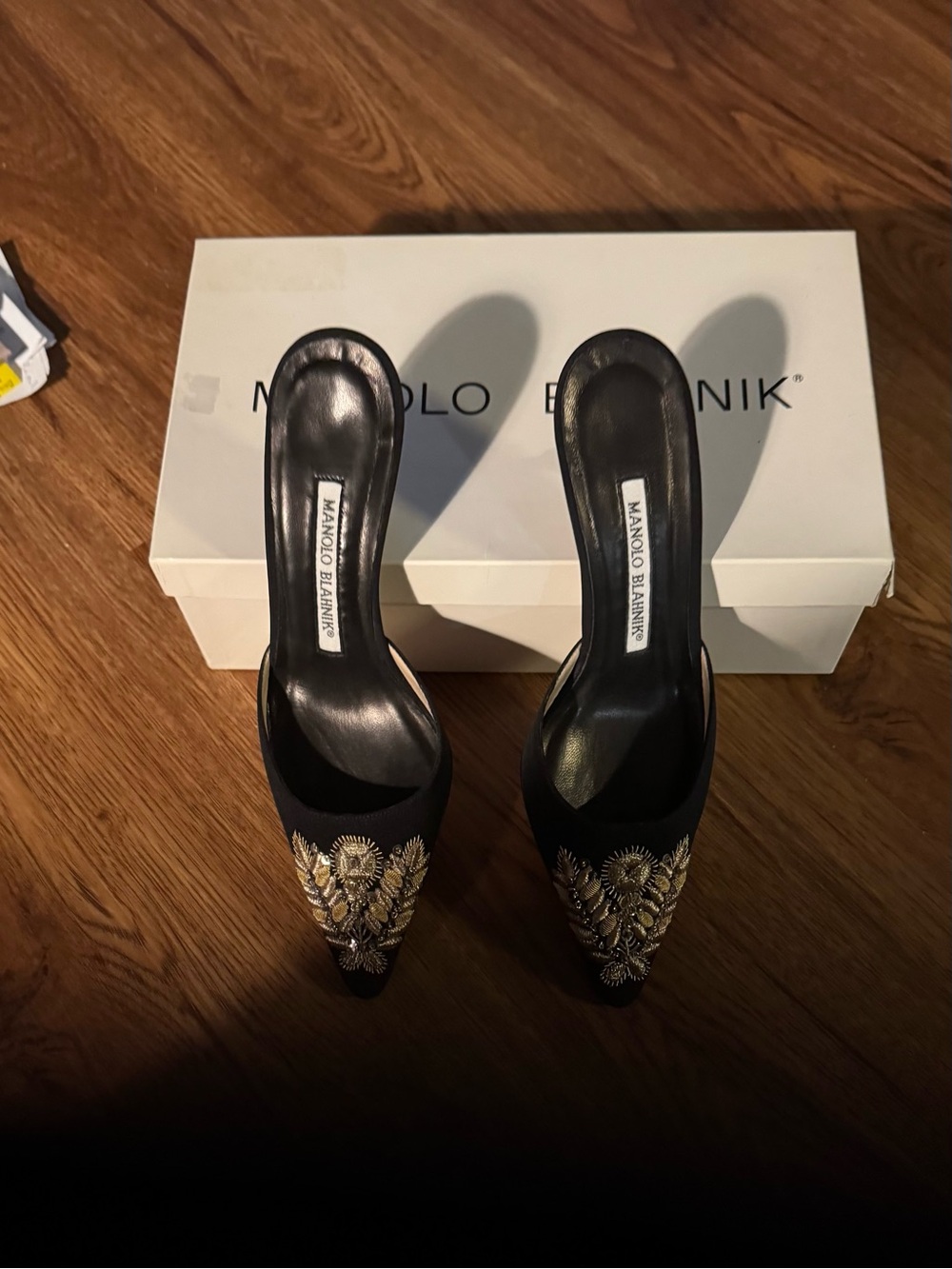 Manolo Blahnik Black Mules with Gold Embroidered Crest